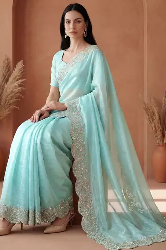 Turquoise embroidered tissue saree