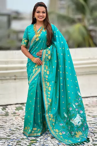 Turquoise ethnic motifs woven design zari banarasi saree