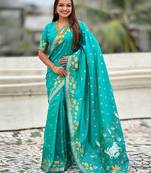 Turquoise ethnic motifs woven design zari banarasi saree