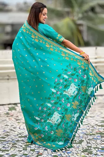 Turquoise ethnic motifs woven design zari banarasi saree