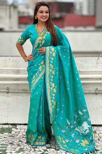 Turquoise ethnic motifs woven design zari banarasi saree
