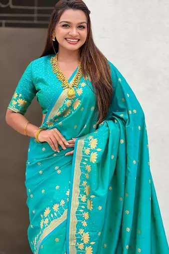 Turquoise ethnic motifs woven design zari banarasi saree