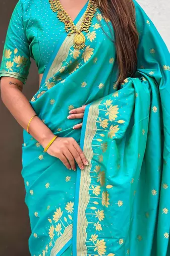 Turquoise ethnic motifs woven design zari banarasi saree