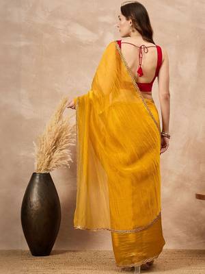 Yellow embellished siquinned border organza saree with unstitched blouse piece 2