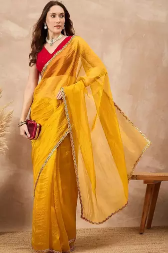 Yellow embellished siquinned border organza saree with unstitched blouse piece