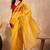 Yellow embellished siquinned border organza saree with unstitched blouse piece