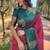 Pink woven design silk blend banarasi saree
