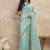 Turquoise sequinned organza designer saree