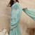 Turquoise sequinned organza designer saree