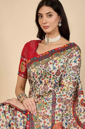 Cream ethnic motifs embroidered banarasi saree