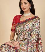 Cream ethnic motifs embroidered banarasi saree