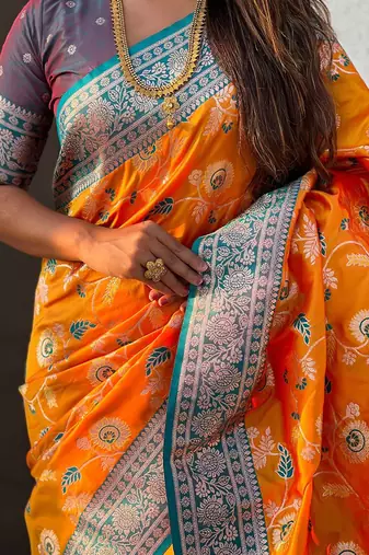 Orange woven design zari banarasi saree