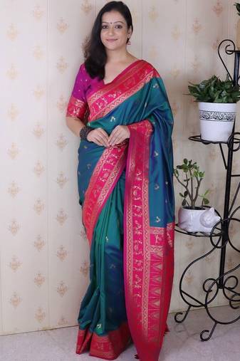 Teal woven design zari silk blend banarasi saree