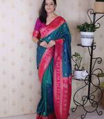 Teal woven design zari silk blend banarasi saree