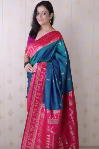 Teal woven design zari silk blend banarasi saree