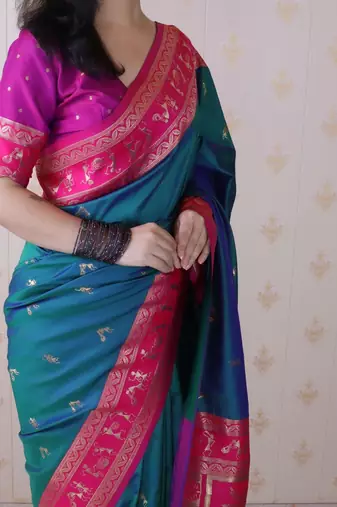 Teal woven design zari silk blend banarasi saree