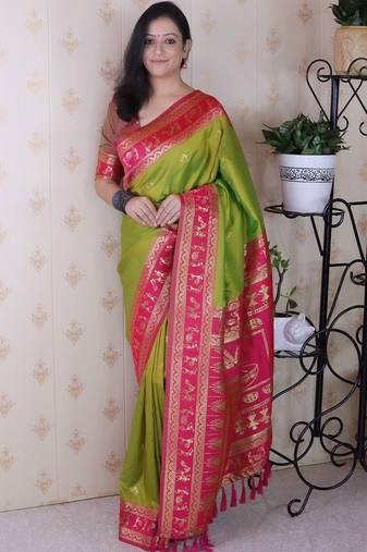 Green ethnic motifs zari silk blend banarasi saree