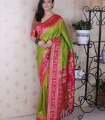 Green ethnic motifs zari silk blend banarasi saree