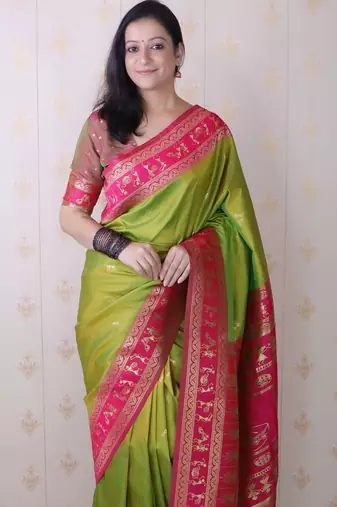 Green ethnic motifs zari silk blend banarasi saree