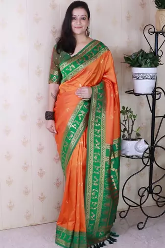 Orange ethnic motifs zari silk blend banarasi saree