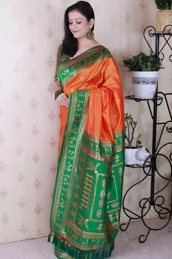 Orange ethnic motifs zari silk blend banarasi saree