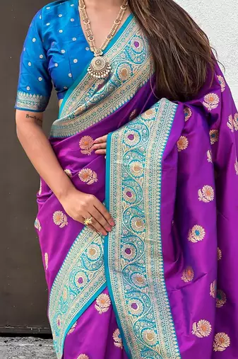 Purple ethnic motifs woven design zari banarasi saree