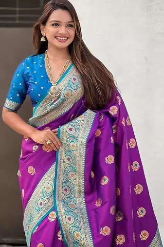 Purple ethnic motifs woven design zari banarasi saree