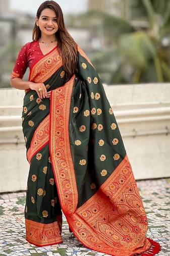 Green woven design zari silk blend banarasi saree