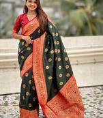 Green woven design zari silk blend banarasi saree