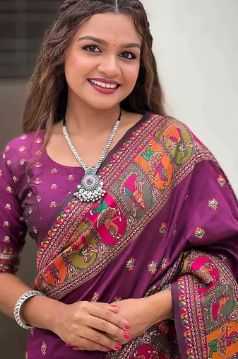 Purple ethnic motifs woven design zari kanjeevaram saree