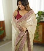 Cream embellished sequinned organza saree