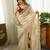 Cream embellished sequinned organza saree