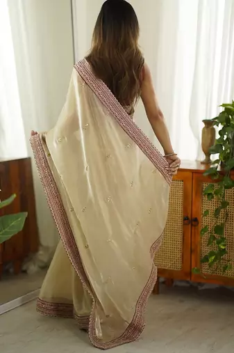 Cream embellished sequinned organza saree