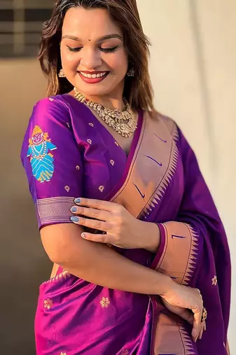 Purple ethnic motifs woven design kanjeevaram saree