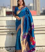 Blue ethnic motifs woven design zari kanjeevaram saree