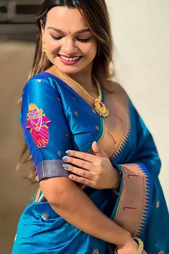 Blue ethnic motifs woven design zari kanjeevaram saree