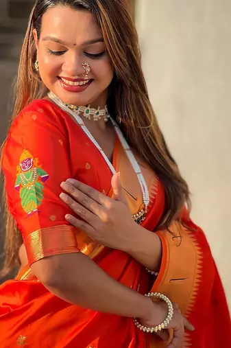 Orange floral zari kanjeevaram saree
