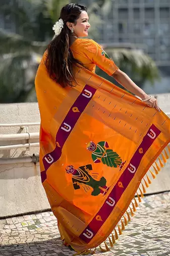 Yellow ethnic motifs woven design zari kanjeevaram saree