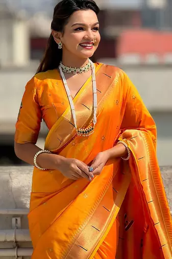 Yellow ethnic motifs woven design zari kanjeevaram saree