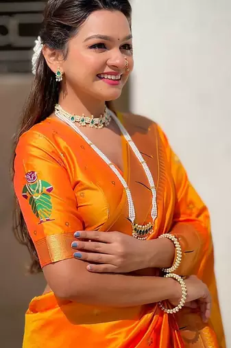 Yellow ethnic motifs woven design zari kanjeevaram saree