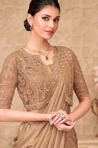 Gold embellished embroidered  georgette heavy work saree