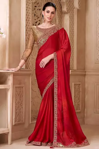 Red ethnic motifs embroidered satin heavy work saree