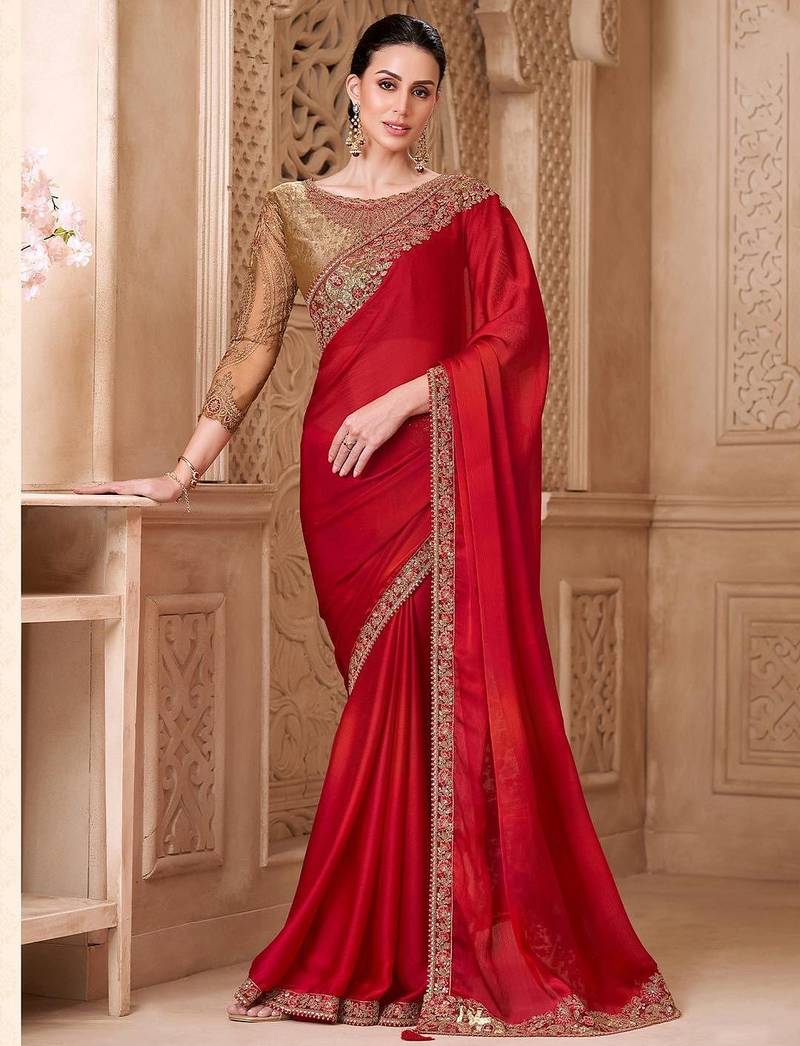 Red ethnic motifs embroidered satin heavy work saree