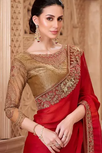 Red ethnic motifs embroidered satin heavy work saree