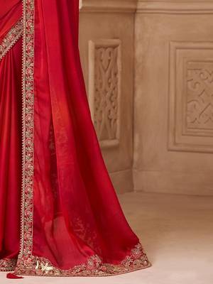 Red ethnic motifs embroidered satin heavy work saree 5