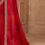 Red ethnic motifs embroidered satin heavy work saree