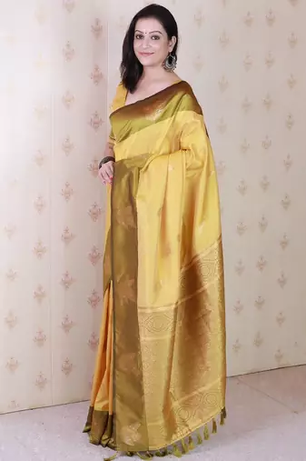Yellow woven design zari silk blend banarasi saree