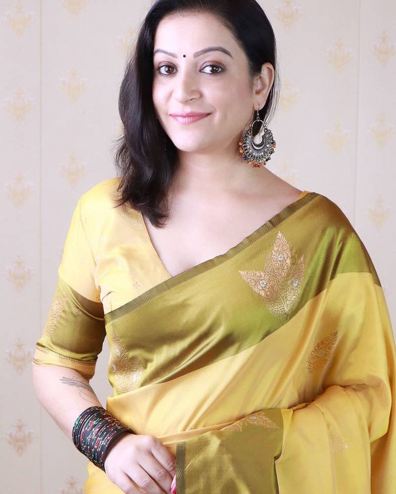 Yellow woven design zari silk blend banarasi saree
