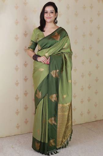 Green woven design zari silk blend banarasi saree