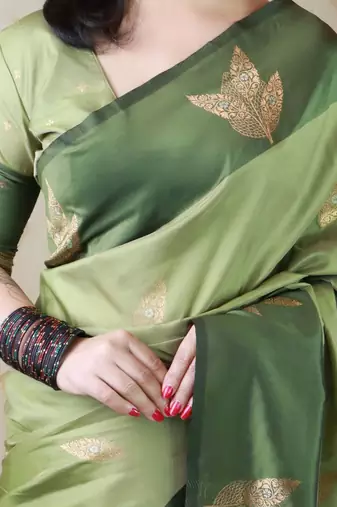 Green woven design zari silk blend banarasi saree